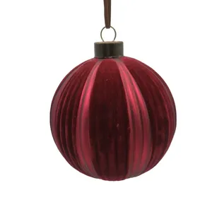 This product is a classic red velvet Christmas ornament ball, perfect for adding a touch of elegance to your holiday decor. The ball is made of high-quality glass and features a beautiful velvet finish. It's perfect for hanging on your Christmas tree or using as a centerpiece for your holiday table.
