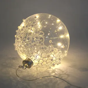 This product is made of clear glass that has been hand-blown, with LED lights, lace and beads. It is 12cm in diameter and battery powered.