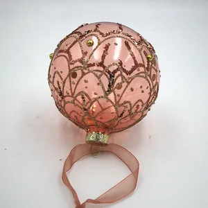 Decorate your Christmas tree with this beautiful rose gold glass ornament.