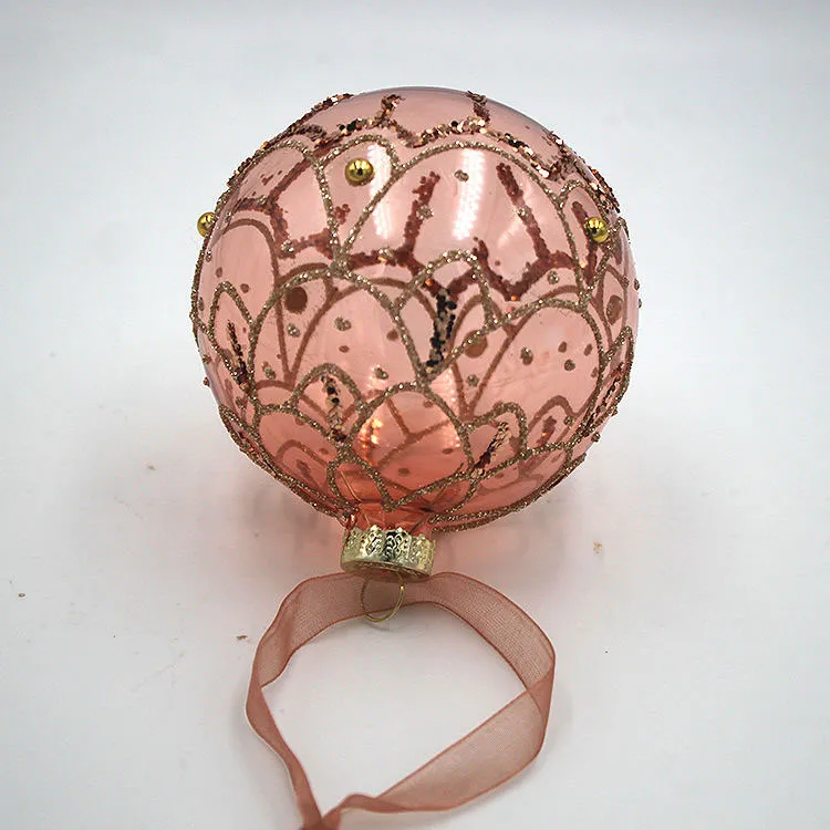 Decorate your Christmas tree with this beautiful rose gold glass ornament.