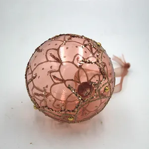This rose gold Christmas ornament features a sophisticated and stylish design that is perfect for any modern Christmas tree.