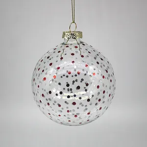This product is made of glass with red and silver dots, giving it a unique and festive look.