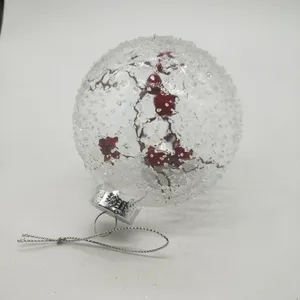 This product has a classic and elegant style with the clear glass and red berries. The textured surface adds a unique touch.