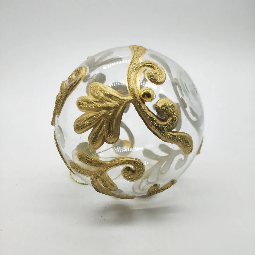 This product is made of high quality clear glass with a golden pattern.