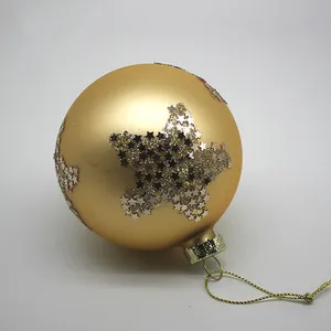 This product is a classic Christmas ornament with a modern twist. It features a gold matte finish and a glitter star design.