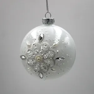 This product is meticulously handmade with a stunning silver snowflake design that adds a touch of intricate beauty to the glass ball.