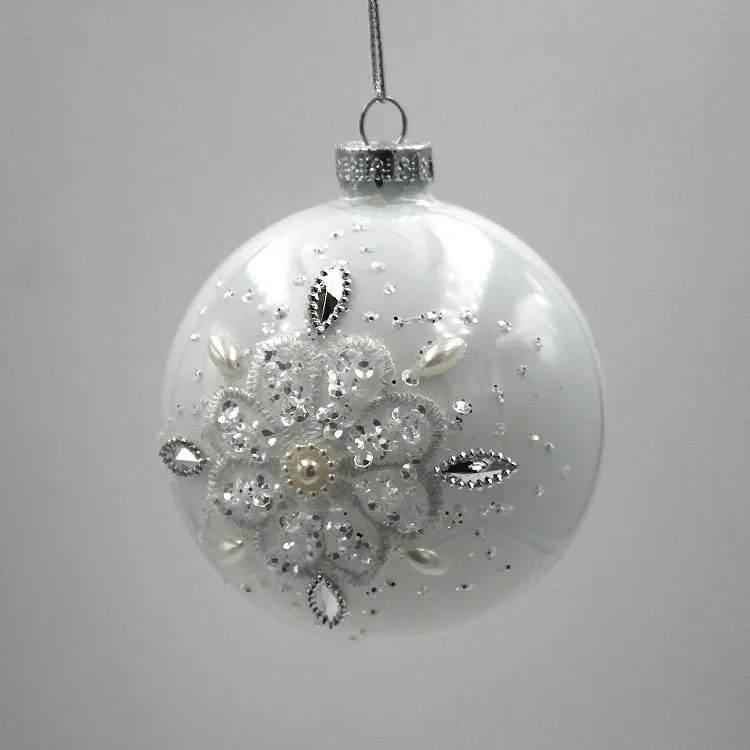 This product is meticulously handmade with a stunning silver snowflake design that adds a touch of intricate beauty to the glass ball.