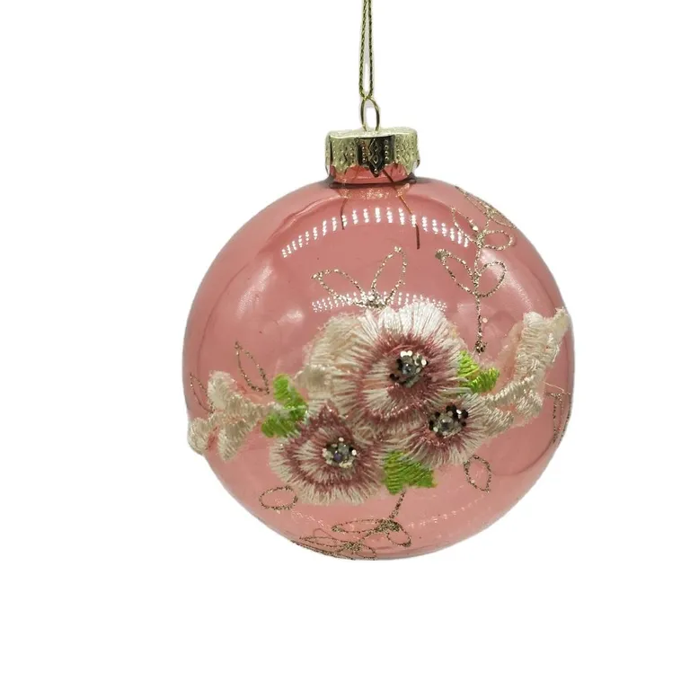This 8cm pink clear transparent glass Christmas ball ornament with floral design is perfect for holiday decoration and wholesale.