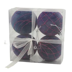 These ornaments are made of high-quality flocked glass with a navy blue color and a festive pink glitter detailing. The ornaments are perfect for adding a touch of luxury to your Christmas tree or home decor, and they are also a great gift for friends and family.