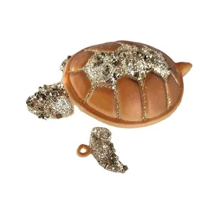 This product is made of high-quality glass and is carefully hand-blown and decorated with glittering details. The delicate and intricate details are sure to impress.