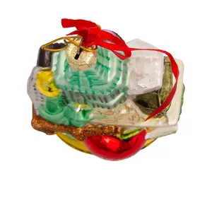 The ornament features vibrant colors and detailed hand-painted designs, capturing the essence of New York City and its iconic landmarks.