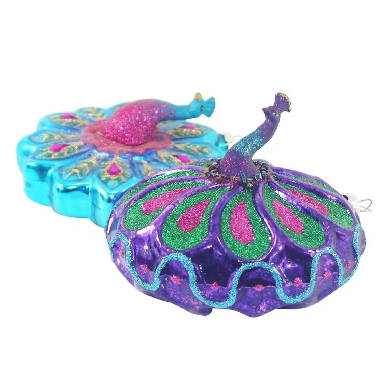 Peacock design glass ornament, perfect for adding a touch of elegance to your Christmas tree decorations. This ornament features intricate details and vibrant colors, making it a unique and eye-catching addition to your holiday decor.