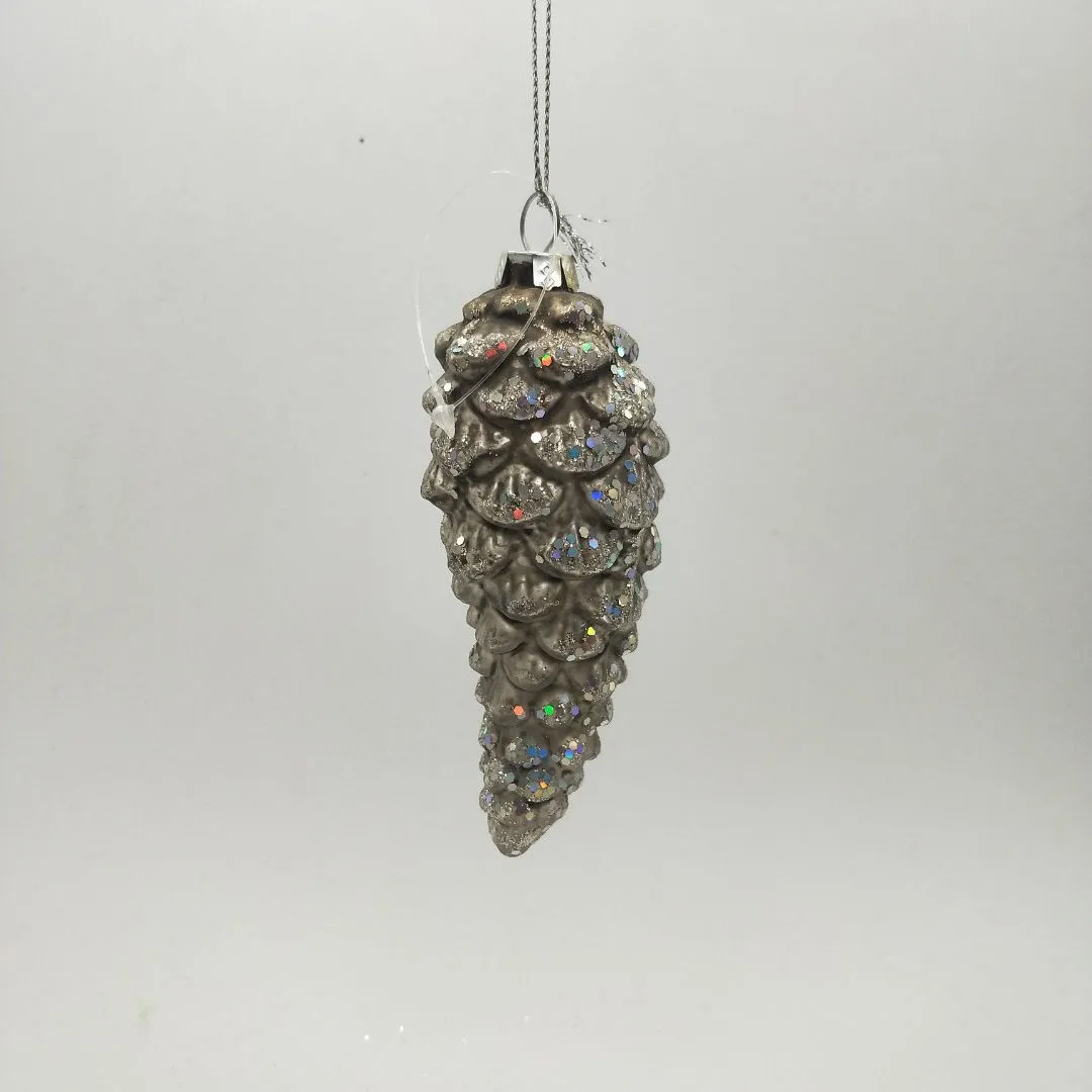 This product has a rustic and natural style that would be perfect for a woodland-themed Christmas decor. The glitter adds a touch of sparkle.