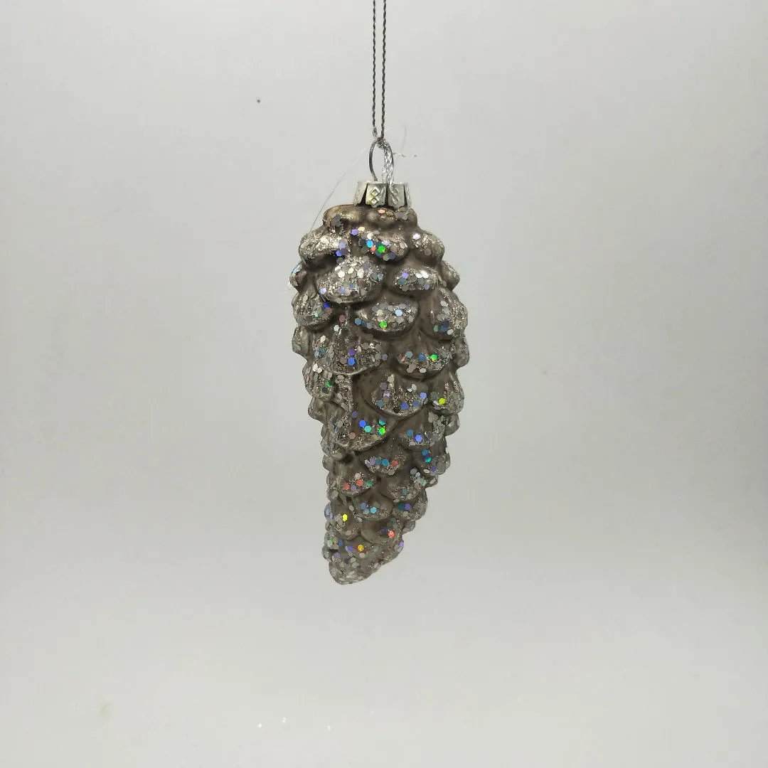 This product can be used to decorate a Christmas tree, a festive centerpiece, or a gift. The glitter and pinecone shape add a touch of whimsy and elegance.