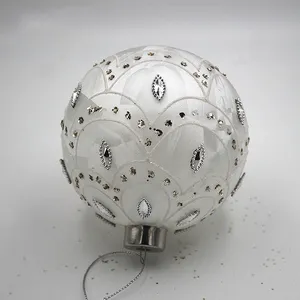 This Christmas ball ornament is crafted from high-quality glass, ensuring durability and a sophisticated look.