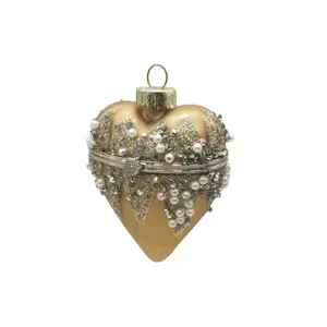 This product is a heart-shaped Christmas ornament that can be opened, making it perfect for holding special treasures or small gifts.