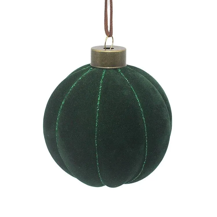 This is a classic Christmas tree ornament, made of glass with a green flocking finish. It measures 8cm in diameter and is perfect for adding a touch of elegance to your Christmas decor. This product is available for wholesale orders and is customizable to meet your specific needs. Made in China, with fast delivery.