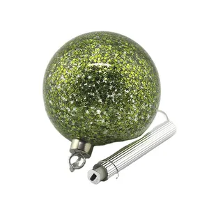 Wholesale 12cm LED Christmas bauble with green stars, glass ornament with light for Xmas tree holiday home decoration, perfect for adding a festive touch to any space.
