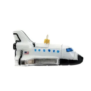 This ornament is carefully hand-blown, creating a unique and beautiful piece. The intricate details of the space shuttle design are brought to life by the skilled artisans.