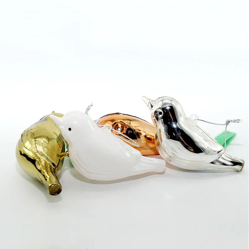 This glass bird ornament is hand-painted with intricate details and a unique and eye-catching design.