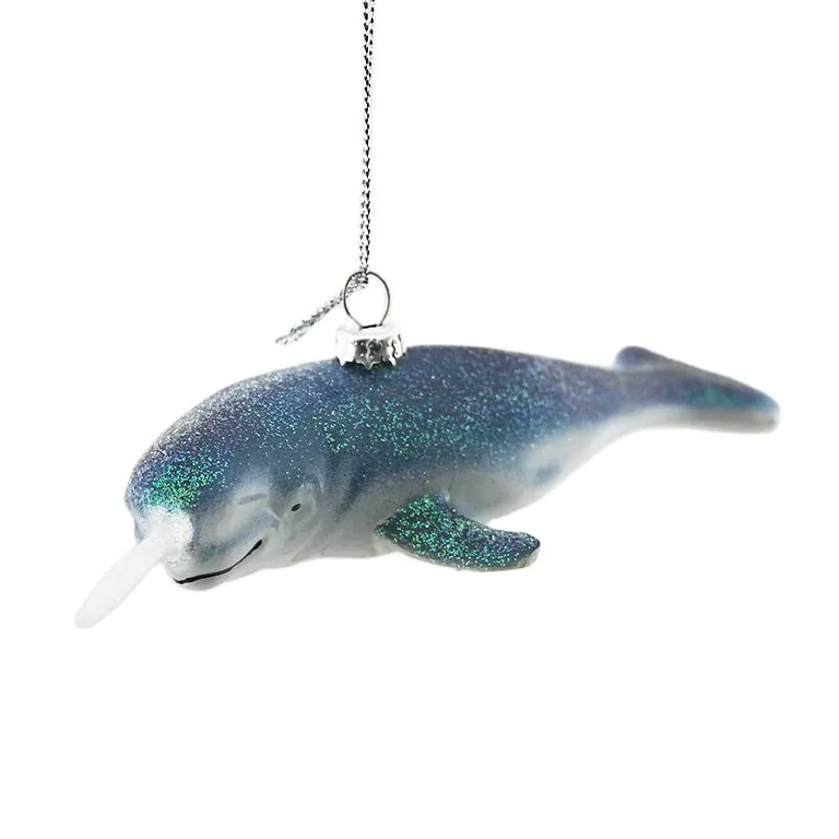 This narwhal ornament adds a whimsical touch to your holiday decor. Its blue and white color scheme and glitter finish make it a unique and eye-catching addition to any Christmas tree.