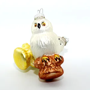 This glass bird ornament is hand blown and features a unique and intricate design.