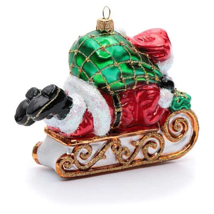 This Christmas Ornament is crafted using a traditional mouth-blown glass making technique, a unique and delicate process. Each piece is unique.