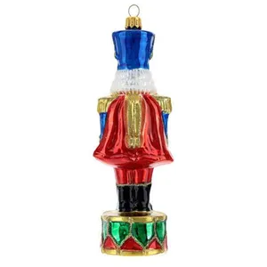 The nutcracker design of this ornament is a classic and timeless choice for holiday decor. It's a whimsical and festive piece that brings a touch of traditional charm to any home.