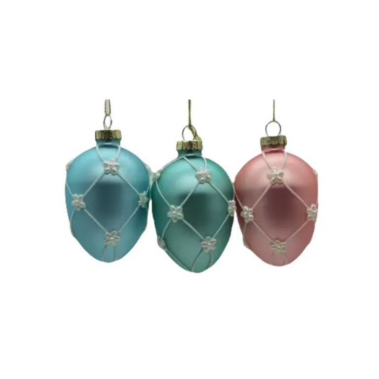 These hand-painted glass Easter egg ornaments are perfect for wholesale and holiday decorations. They feature delicate floral designs and a beautiful egg shape.