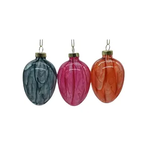 These Easter egg ornaments are made of glass, hand-painted and have a unique marbled pattern.