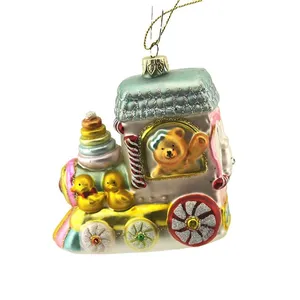 This adorable hand-painted glass Christmas train ornament features a teddy bear, ducklings, and colorful decorations, making it the perfect addition to any holiday decor.