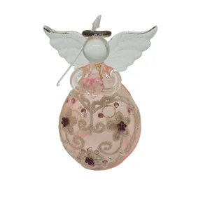 This delicate glass angel ornament features a pink heart, wings and halo, perfect for adding a touch of elegance to your Christmas tree.