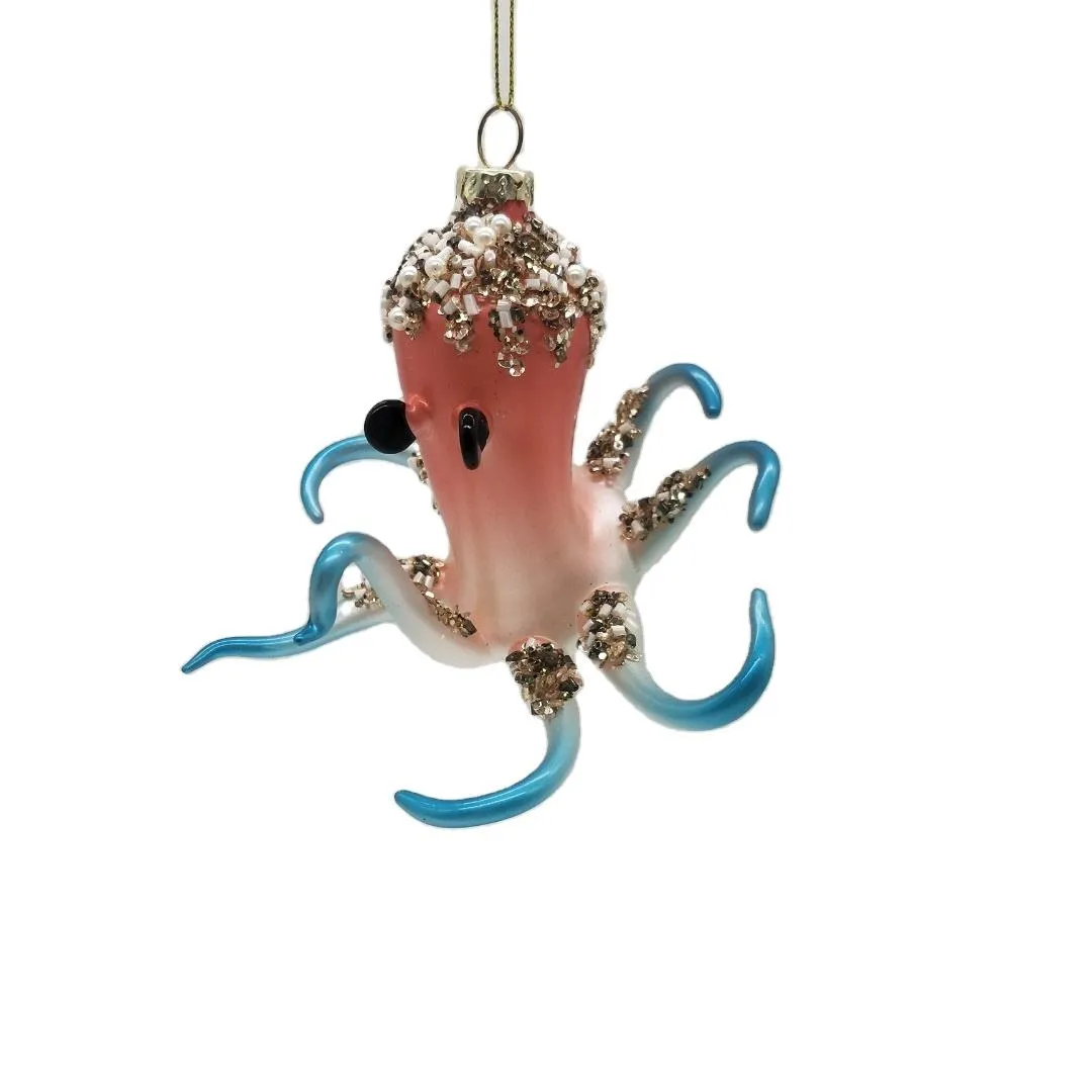 This Christmas ornament is made of high-quality glass, making it durable and long-lasting. The intricate details and beautiful color combinations make it a truly special piece. This ornament will be sure to bring a touch of elegance and whimsy to your holiday decorations.
