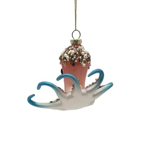 This octopus ornament is perfect for adding a festive touch to your Christmas tree, mantel, or any other holiday display. It can also be used as a unique gift for friends and family. Its eye-catching design is sure to make it a standout decoration.