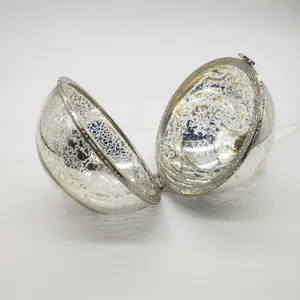 This product is made of glass and has a mercury silver finish.