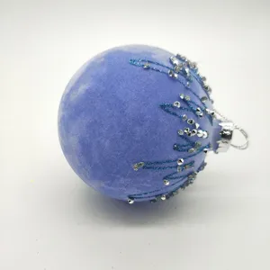 This product is made from high-quality glass that is blown into a round shape. The velvet flocking is then applied to the surface, giving it a soft and luxurious feel.