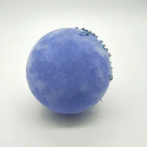 This product is a classic Christmas ornament with a modern twist. The velvet flocking and silver glitter give it a touch of sophistication, while the blue color is both elegant and festive.