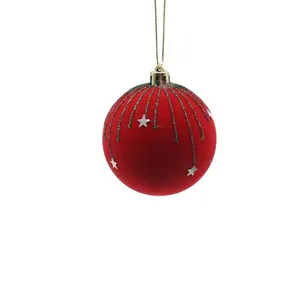 This red flocked Christmas ball with stars is perfect for decorating your home for the holidays. It can also be used as a wedding decoration or party supply.