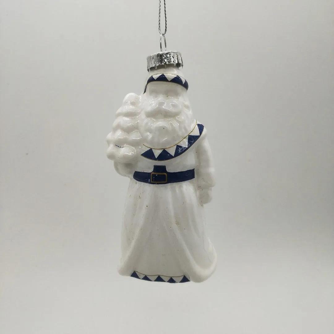 This Santa Claus ornament is crafted from durable and beautiful glass.