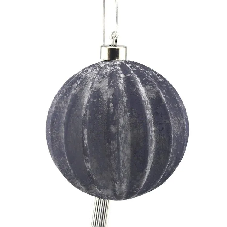 This Christmas ornament is a classic round glass ball with a light and a matte finish. It features a delicate, ribbed texture and is perfect for adding a touch of elegance and holiday cheer to your home décor.