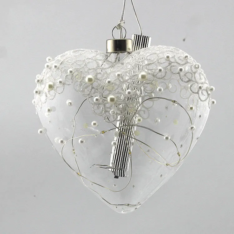 The lace design on this product is created with a delicate and intricate hand-painting technique, adding a touch of artistry and elegance to the ornament.