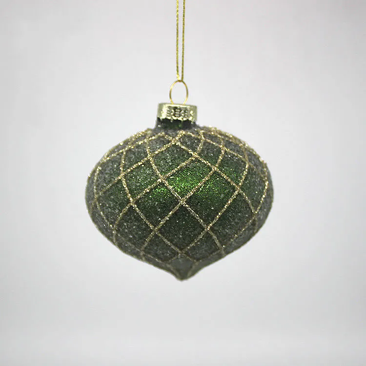 This product is a Christmas ornament ball that is handcrafted from glass and features a green glitter finish and a gold lattice design.