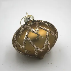 This Christmas ornament is crafted from high-quality glass, boasting a unique onion shape and a delicate glitter finish.