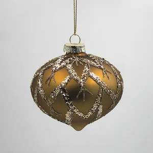 This Christmas ornament is made by hand, showcasing intricate details and a charming onion shape.