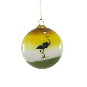 This product is a hand-painted glass Christmas ornament featuring a bird design, with a gradient of yellow and green. The ornament is perfect for adding a touch of elegance to your Christmas decor.