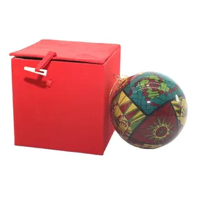 This product is a hand-blown glass ball with a geometric pattern, making it a unique and festive addition to any Christmas tree.