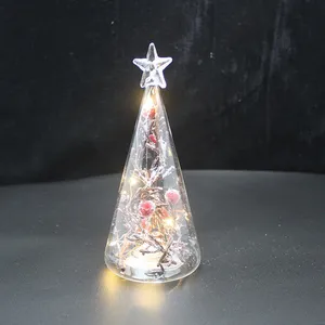 This product is crafted from clear glass with LED lights, decorative berries, and frosted branches. It is a beautiful and unique Christmas ornament.