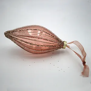 This product features a modern and elegant style, with a rose gold color and clear glass, perfect for a stylish and modern Christmas decoration.