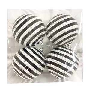 The ornaments are printed with a red and silver striped design that is both eye-catching and festive.