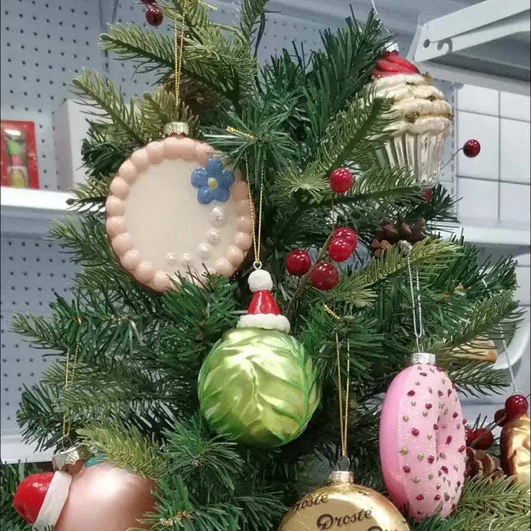 This product is a whimsical and unique collection of Christmas ornaments that are sure to add a touch of fun to your holiday decor. The hand-blown glass resin ornaments are customizable and perfect for wholesale customers.